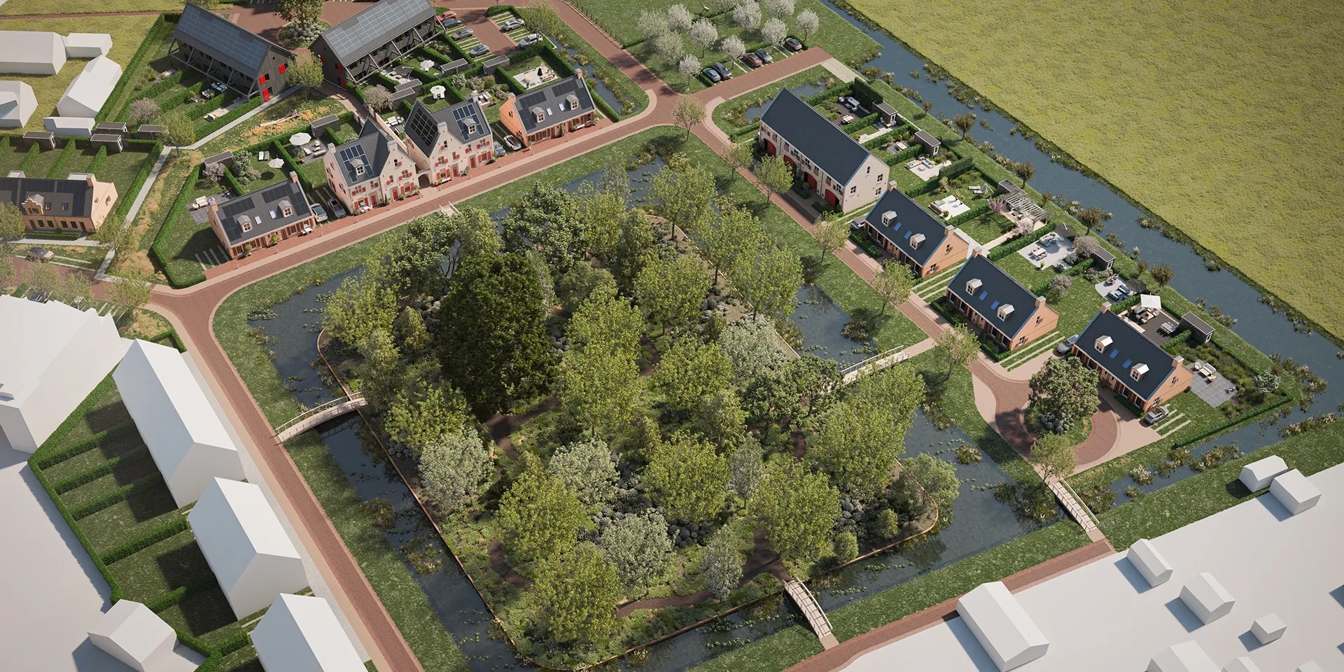 Vogelvlucht van woningen met een groen park in het midden