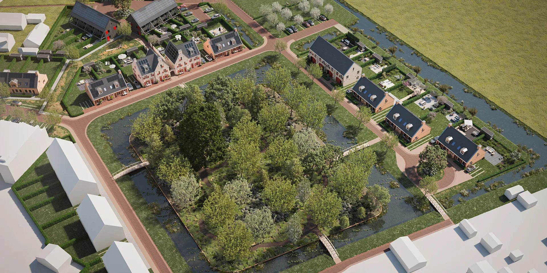 Vogelvlucht van woningen met een groen park in het midden