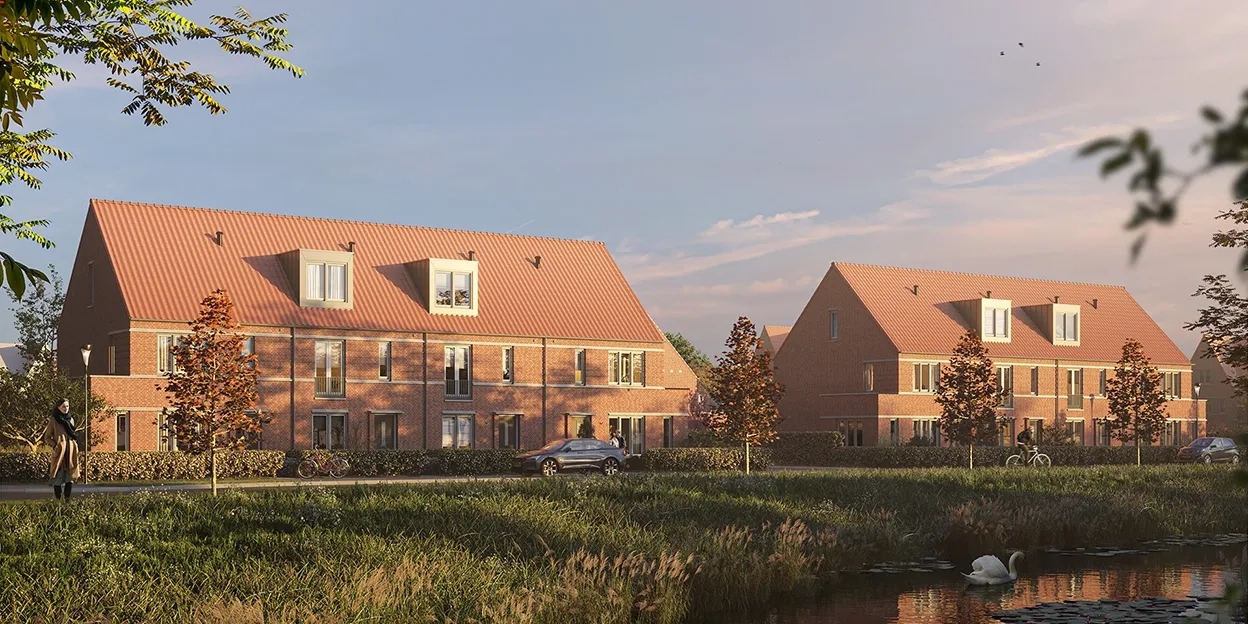 Impressie van de rijwoningen met een watertje waar een zwaan in zwemt